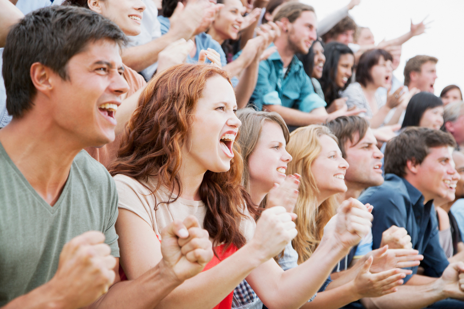 Fans cheering in crowd